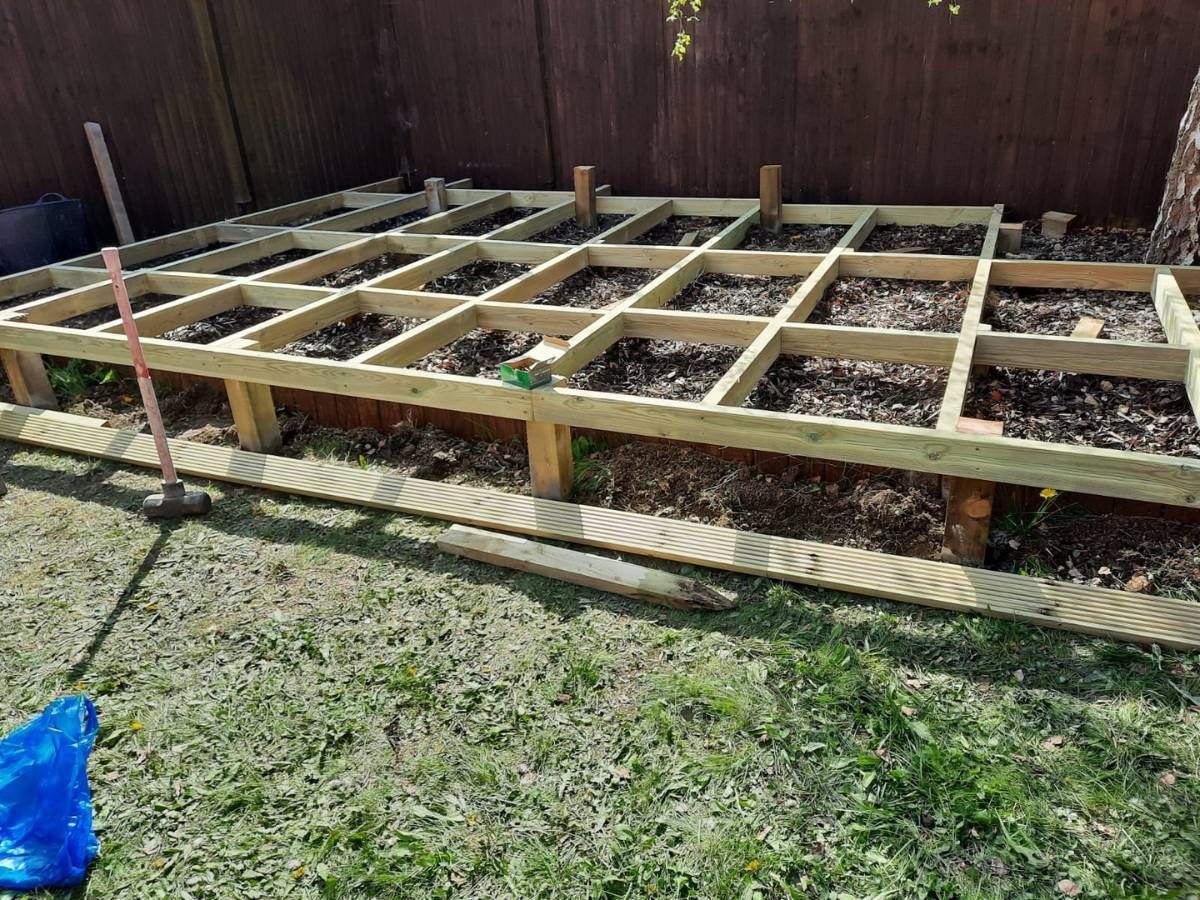 Timber decking frame being built in a Leeds garden