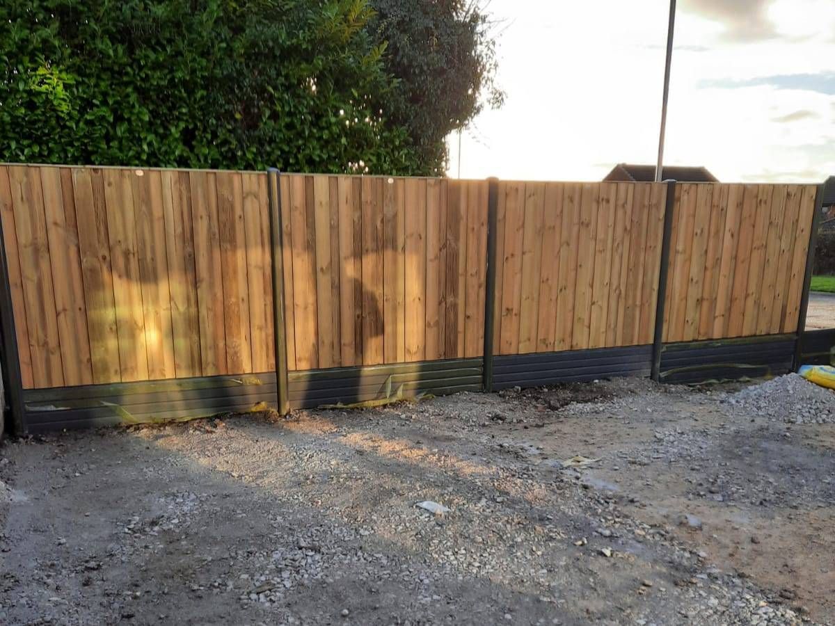 Paving Leeds featheredge fencing with composite posts and composite gravel boards