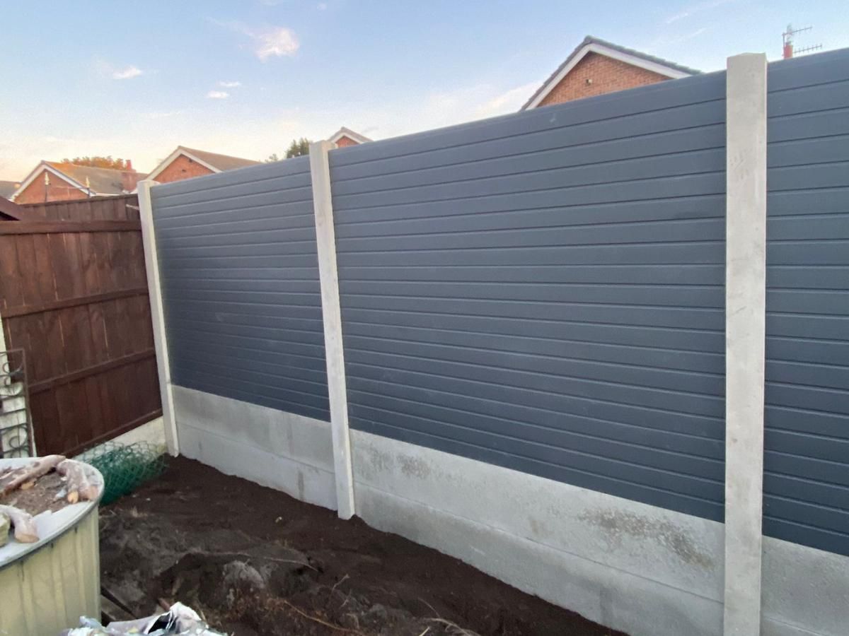 Eco range composite fencing with new concrete posts and smooth gravel boards