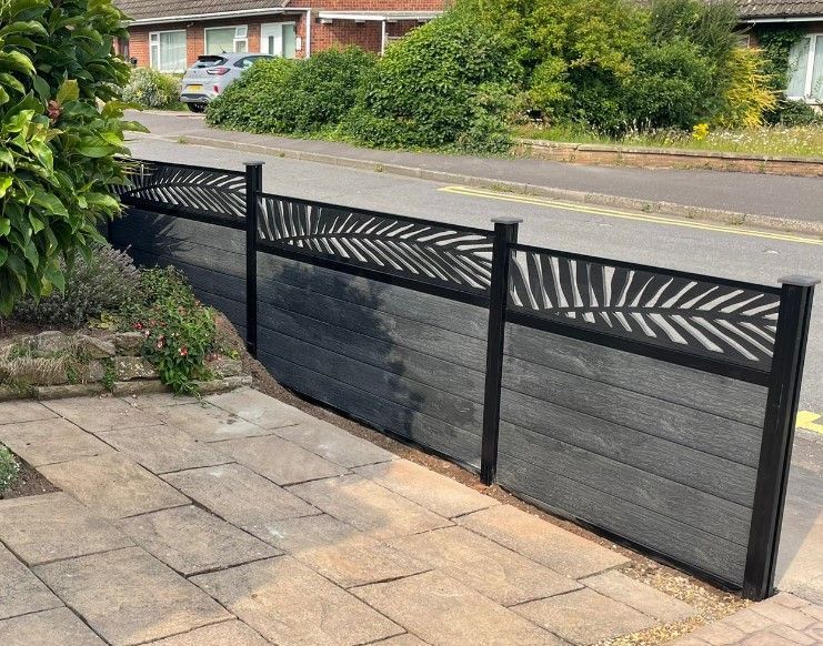 Anthracite grey composite fence panels installed by Paving Leeds