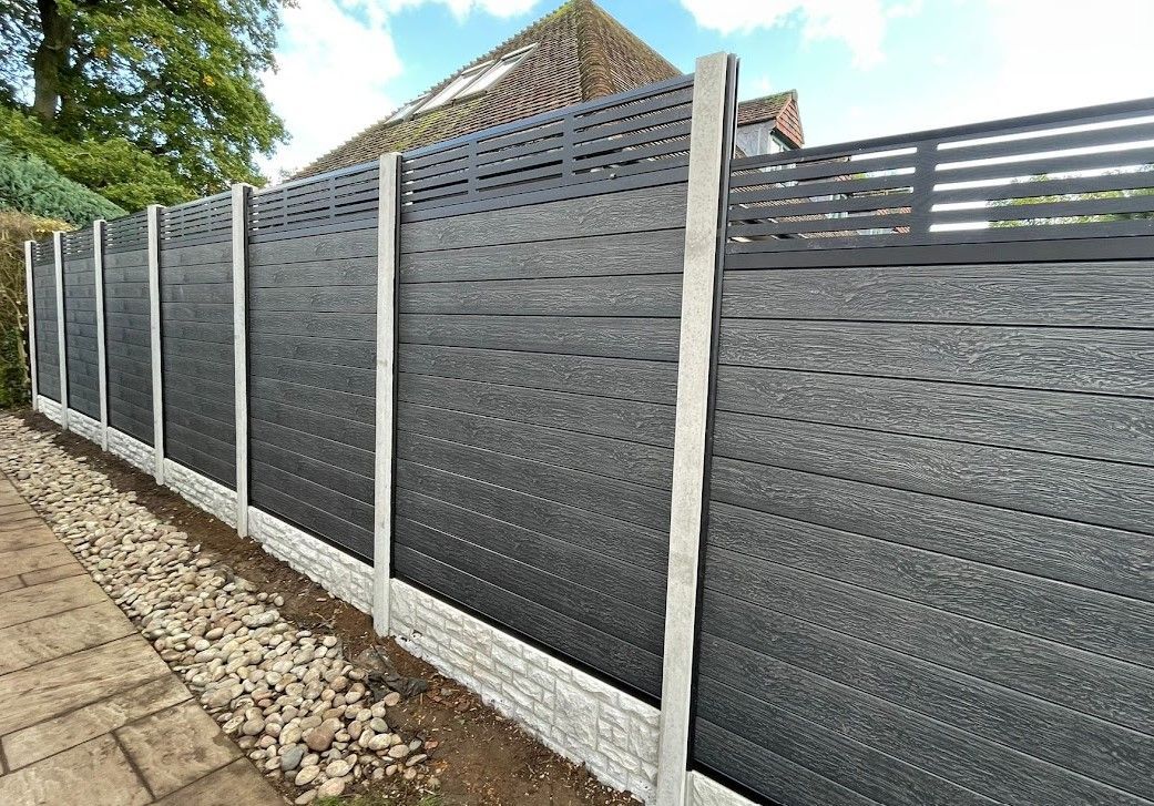 Graphite grey composite fence panels with a black screen in Leeds