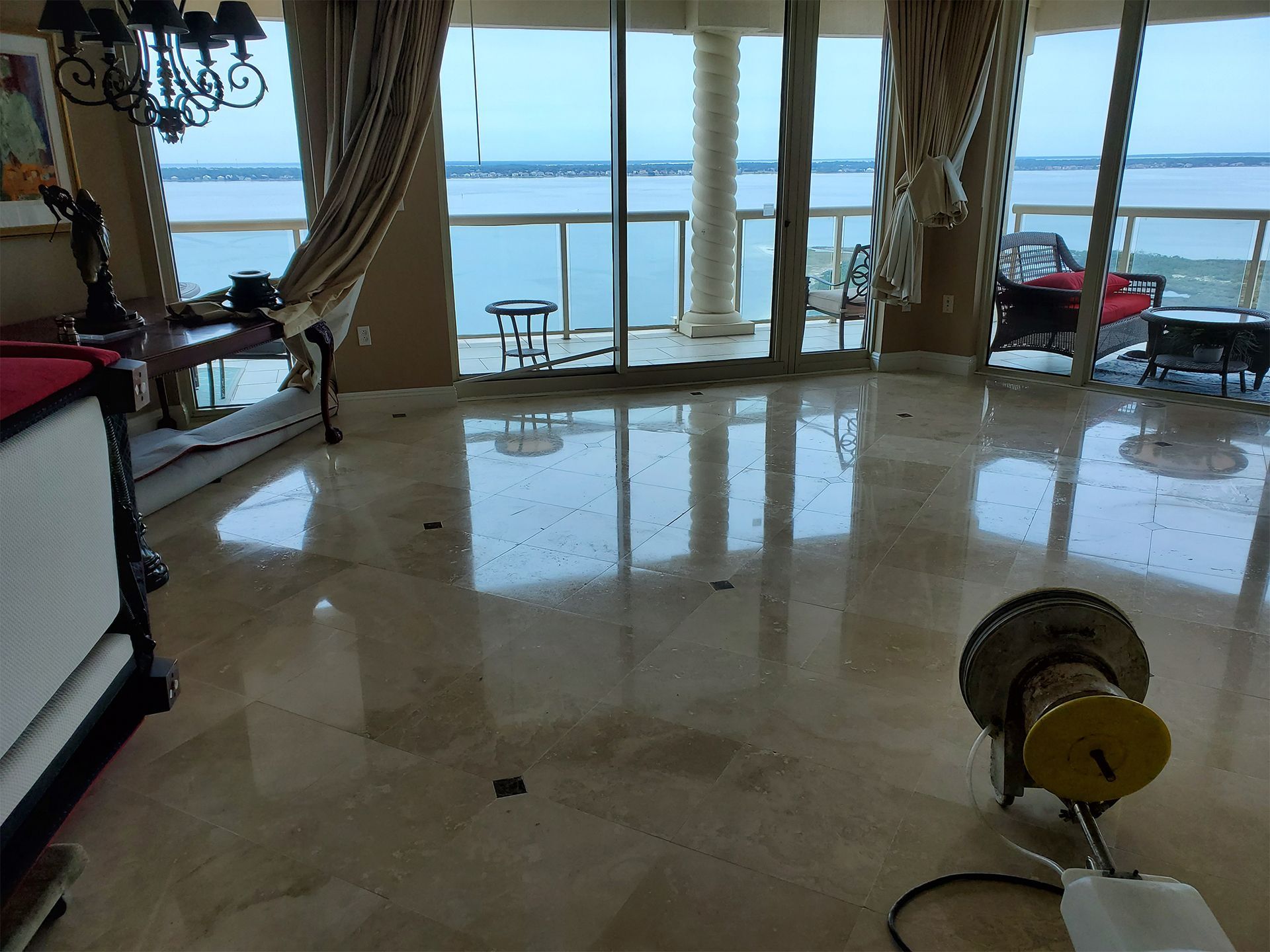 Travertine flooring showing natural stone patterns and variations