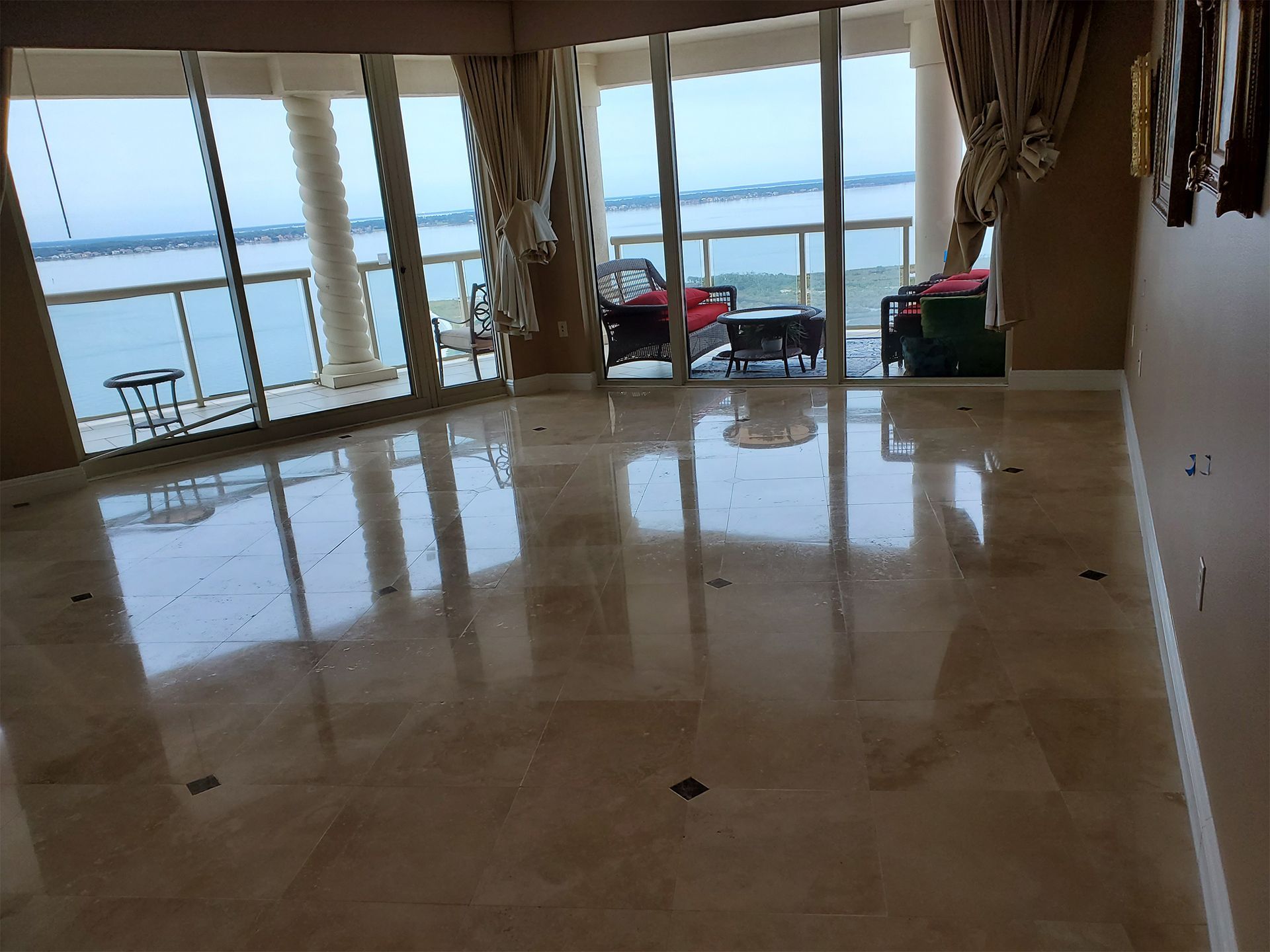 Residential travertine tile flooring after professional polishing