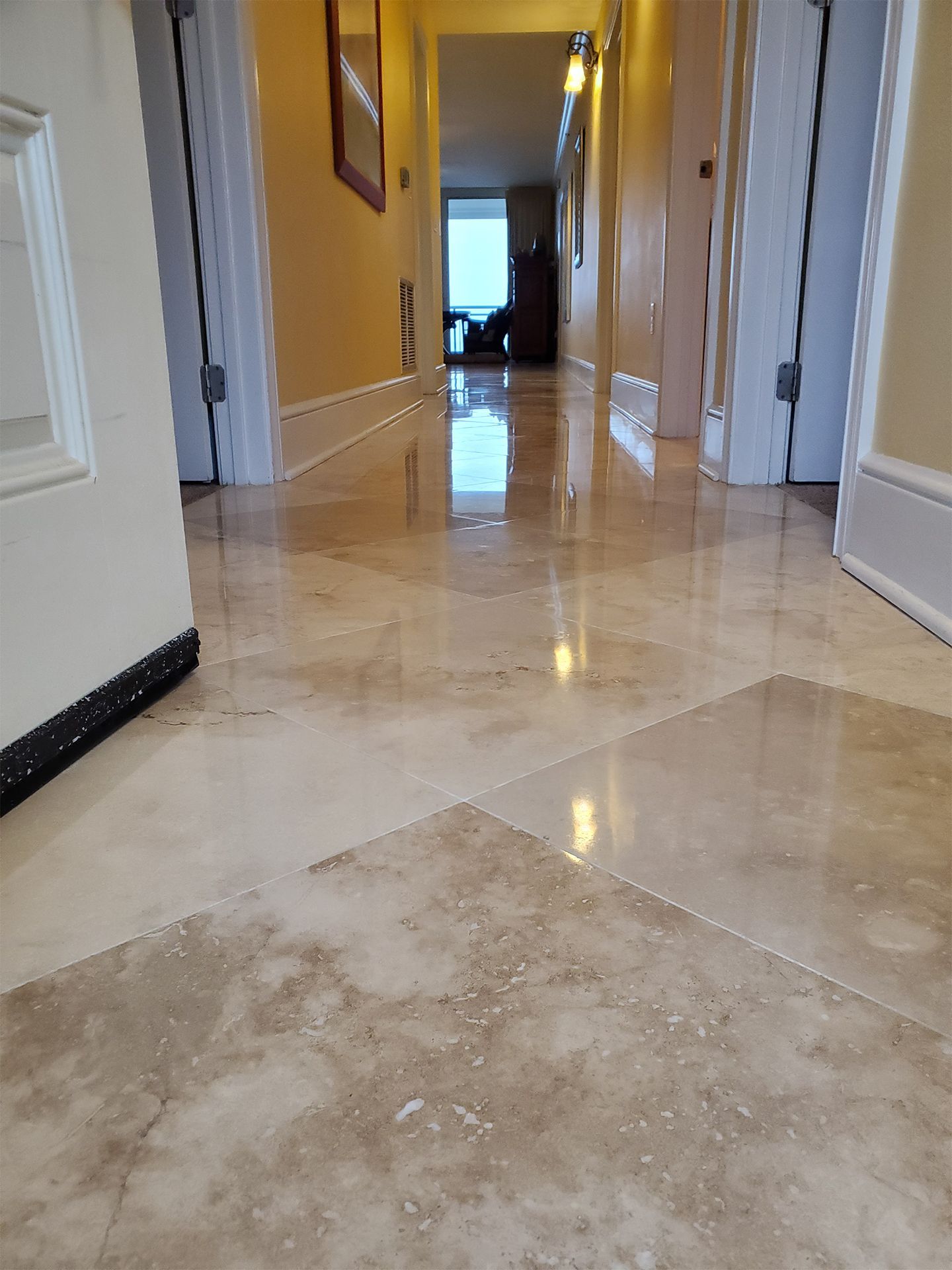 Natural travertine stone floor with polished finish