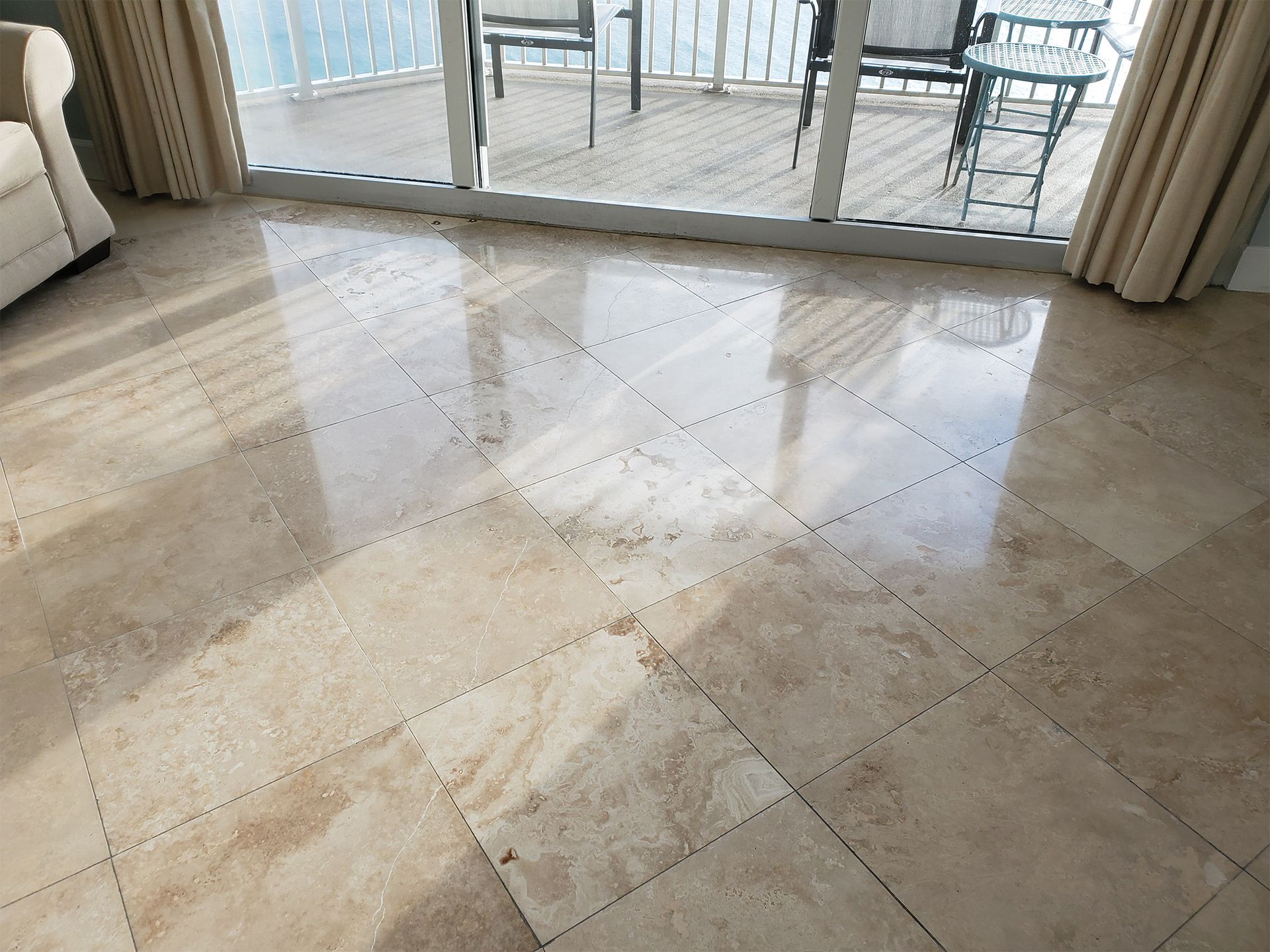 Polished travertine tile floor in a residential home