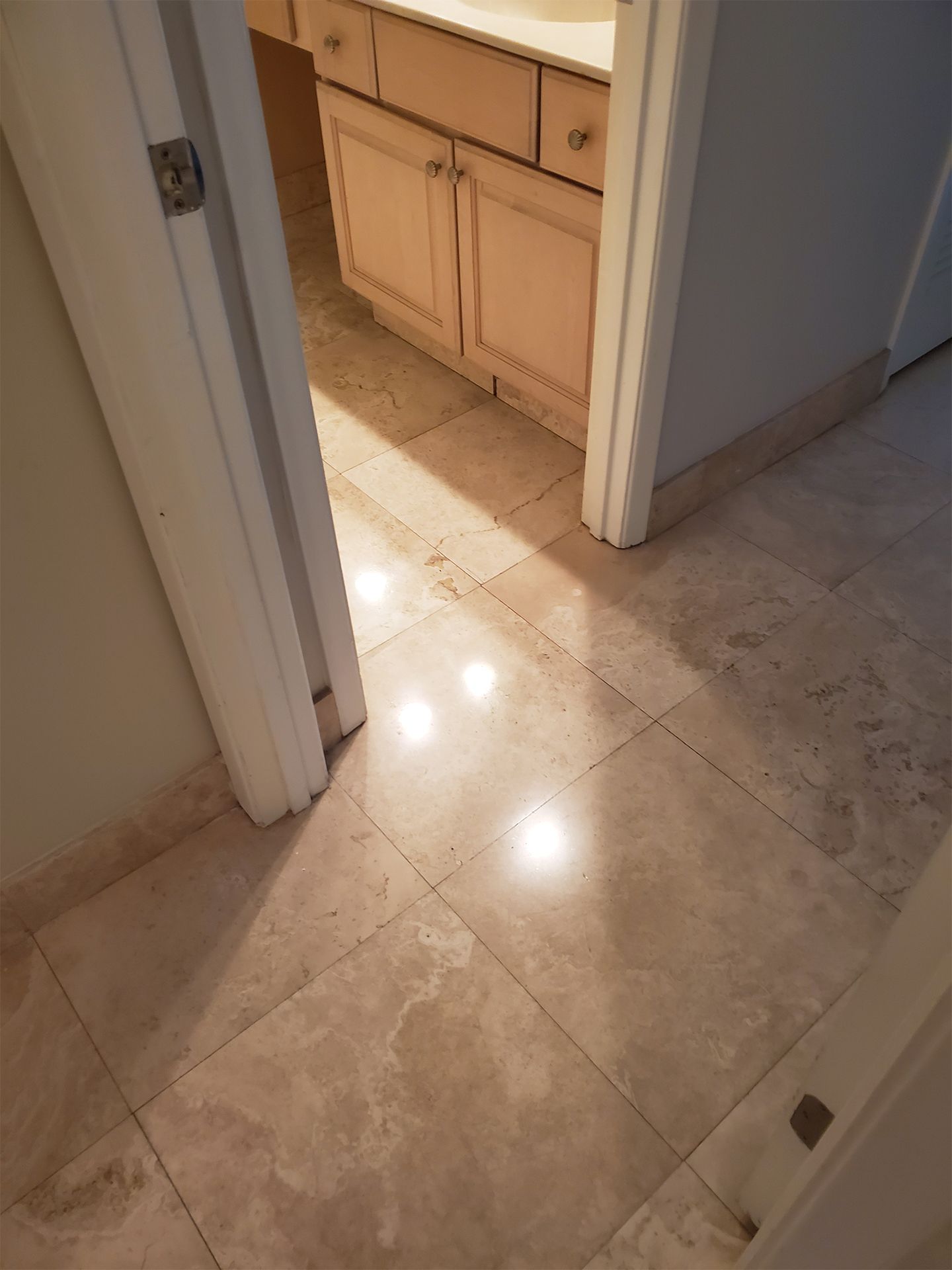 Close-up of natural travertine bathroom flooring