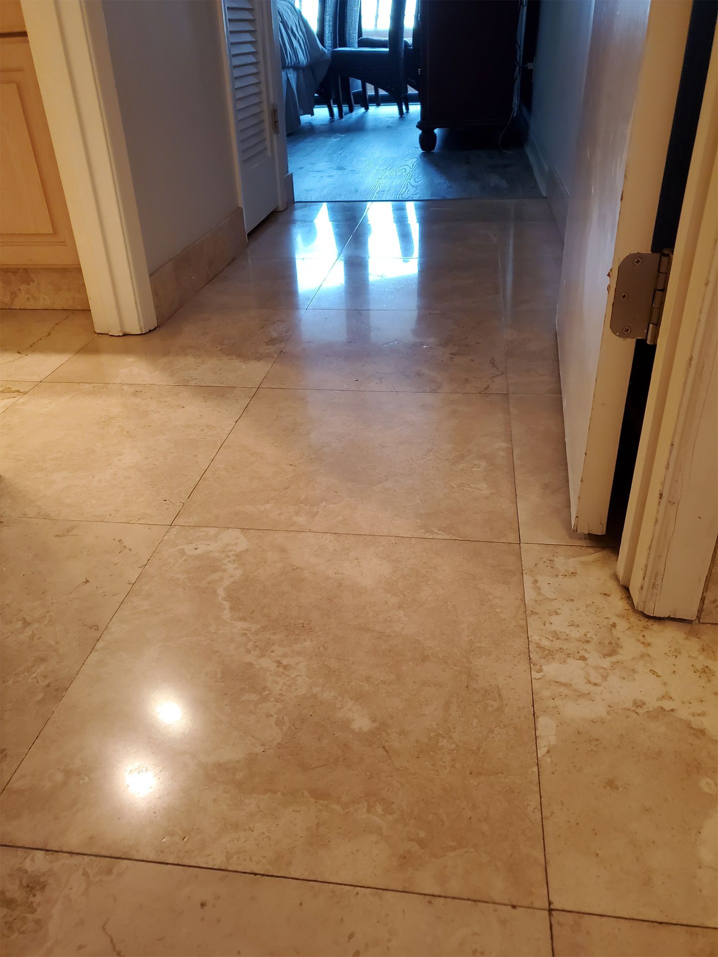 Travertine tile flooring in a residential bathroom