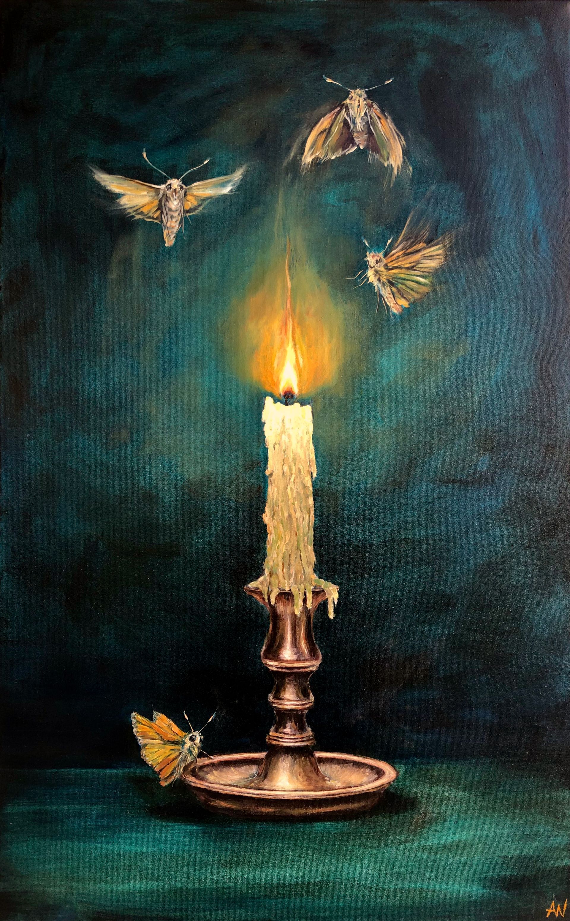 A candle in a bronze holder with moths flying towards the flame in a teal setting.