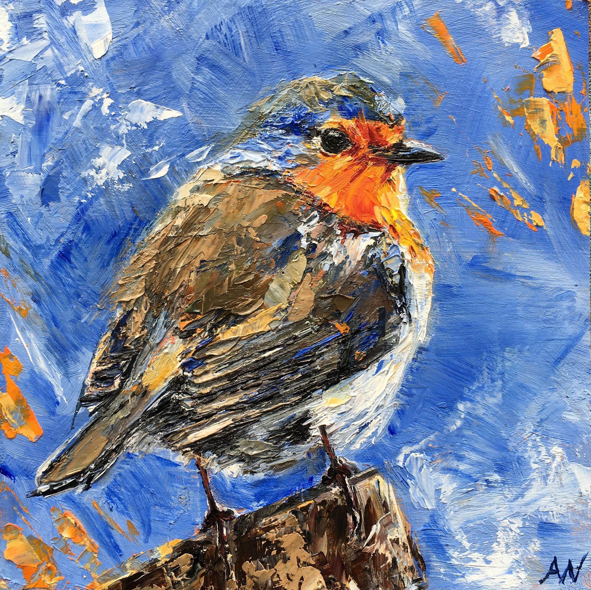 A robin with an orange breast perches on a block against a green background, with an angry expression.