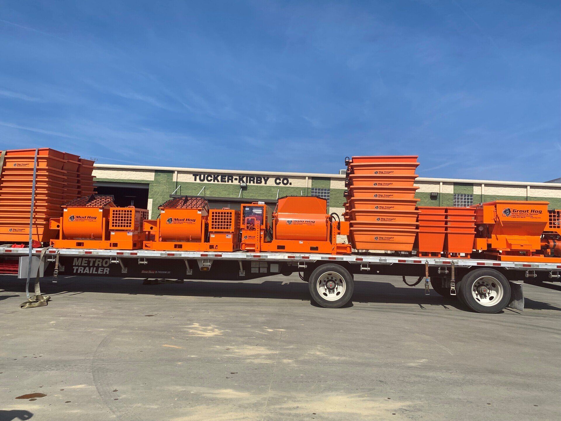 Cargo Truck Loaded With Construction Equipment — NC & SC — Tucker-Kirby Co.