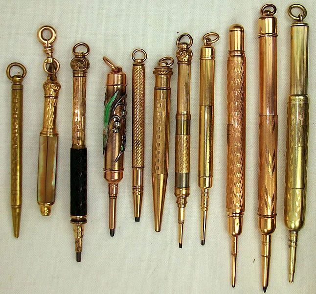 Verzameling antieke gouden vulpotloden, diverse uitvoeringen.