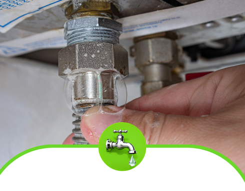 Hand tightening a chrome pipe fitting beneath a sink, with a green faucet icon overlay.