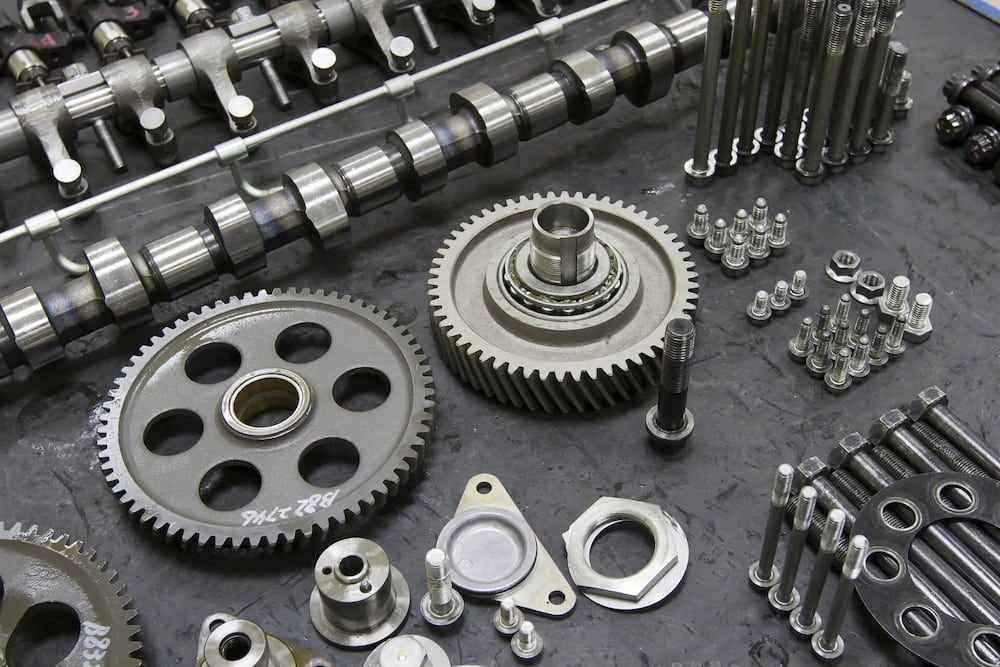 There Are Many Different Types Of Metal Parts On The Table — Goodyear Autocare Bowen in Bowen, QLD