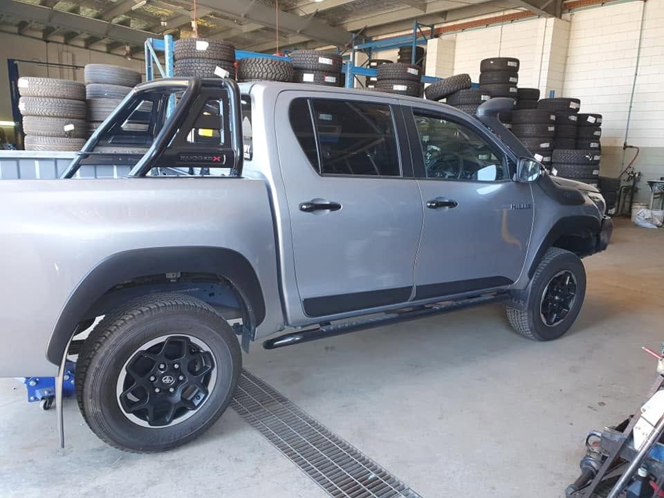 Silver Pickup Truck with Black Wheels Parked Inside an Auto Shop — Goodyear Autocare Bowen in Bowen, QLD