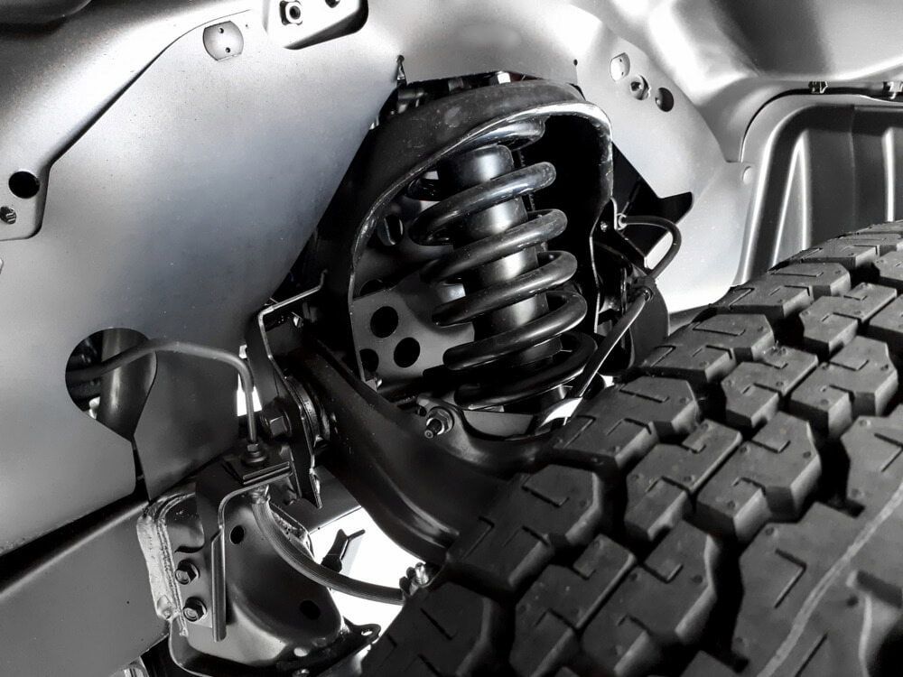 A Car Suspension With A Tire — Goodyear Autocare Bowen in Bowen, QLD