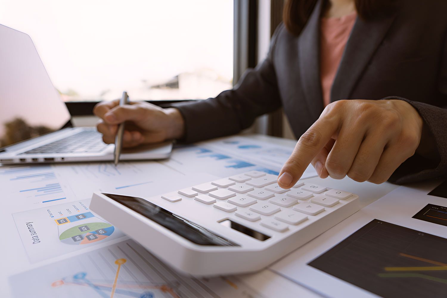 Accountant Man Hand Press On Calculator For Make Financial Report — Whitson Dawson Accountants in Mackay, QLD