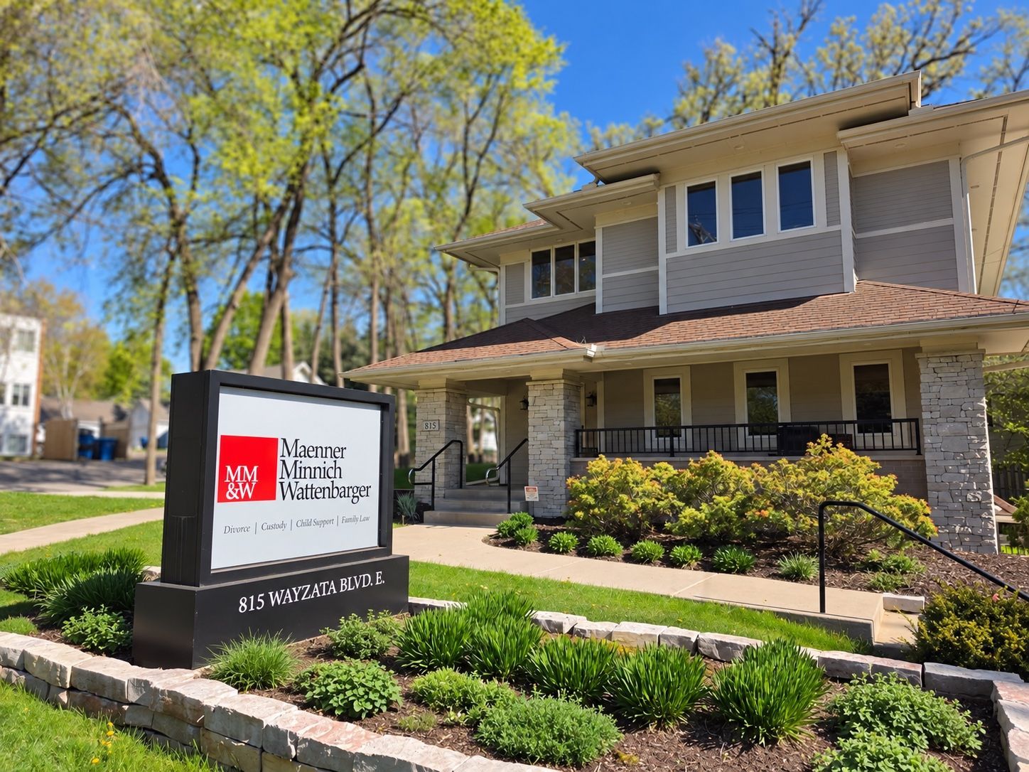 Maenner Minnich & Wattenbarger office and street sign at 815 Wayzata Boulevard East in Wayzata, Minnesota