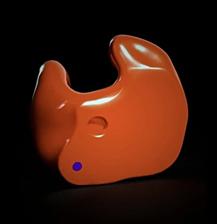 An orange object with a blue dot on it