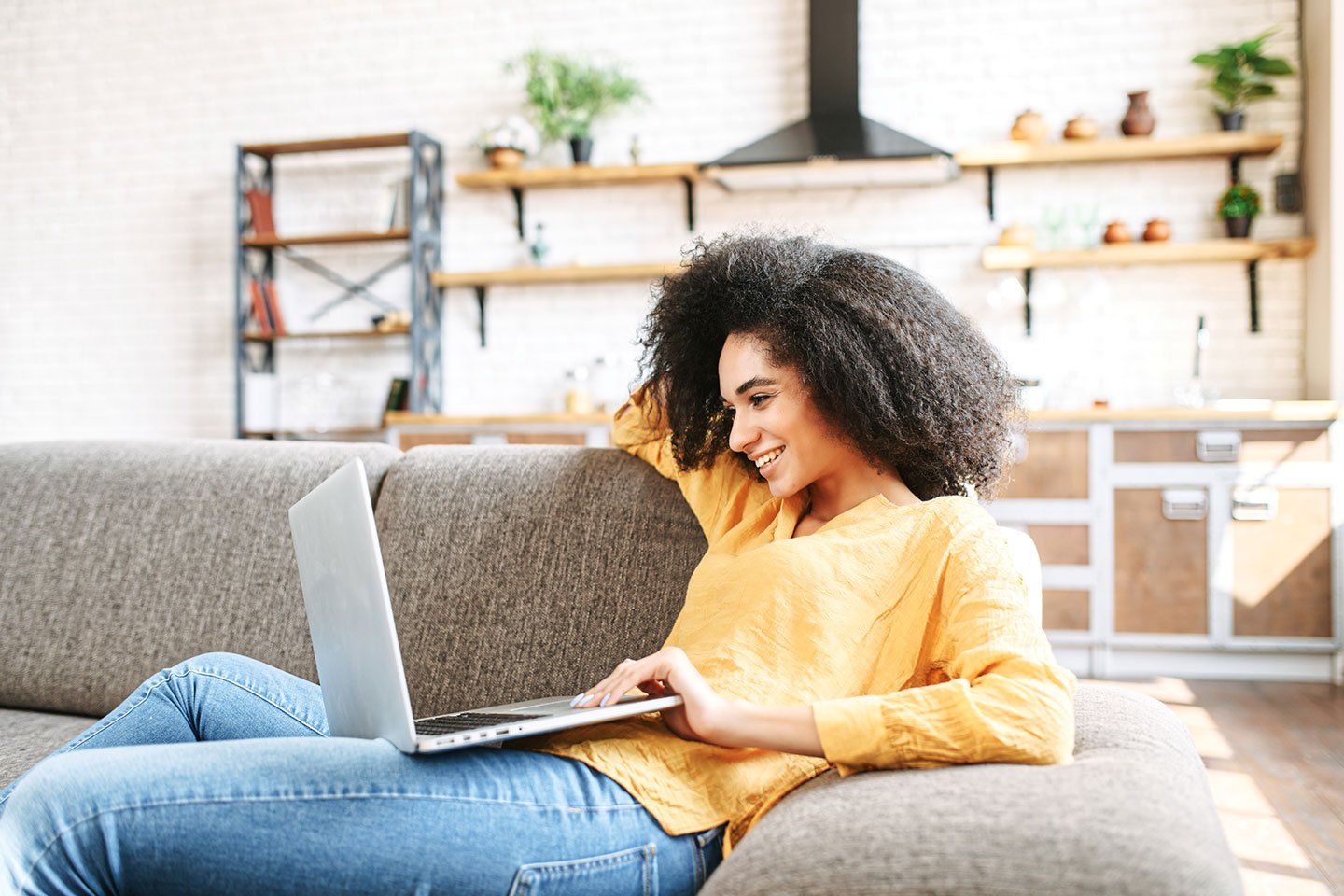 Woman sat at home working