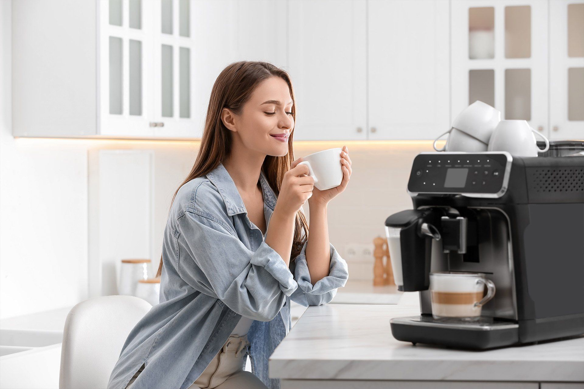 Smiling woman drinking coffee