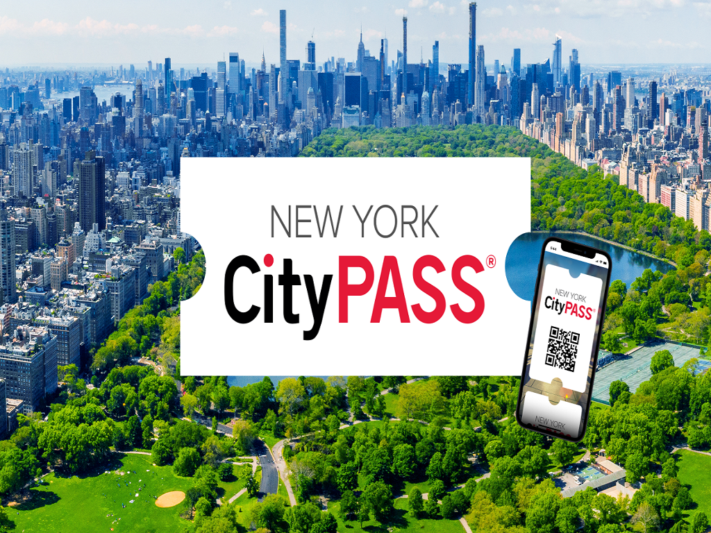 An aerial view of central park in new york city with a city skyline in the background.