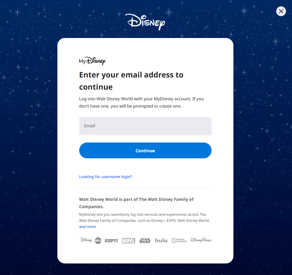 Disney+ sign-in screen with email field and blue Continue button on a starry blue background