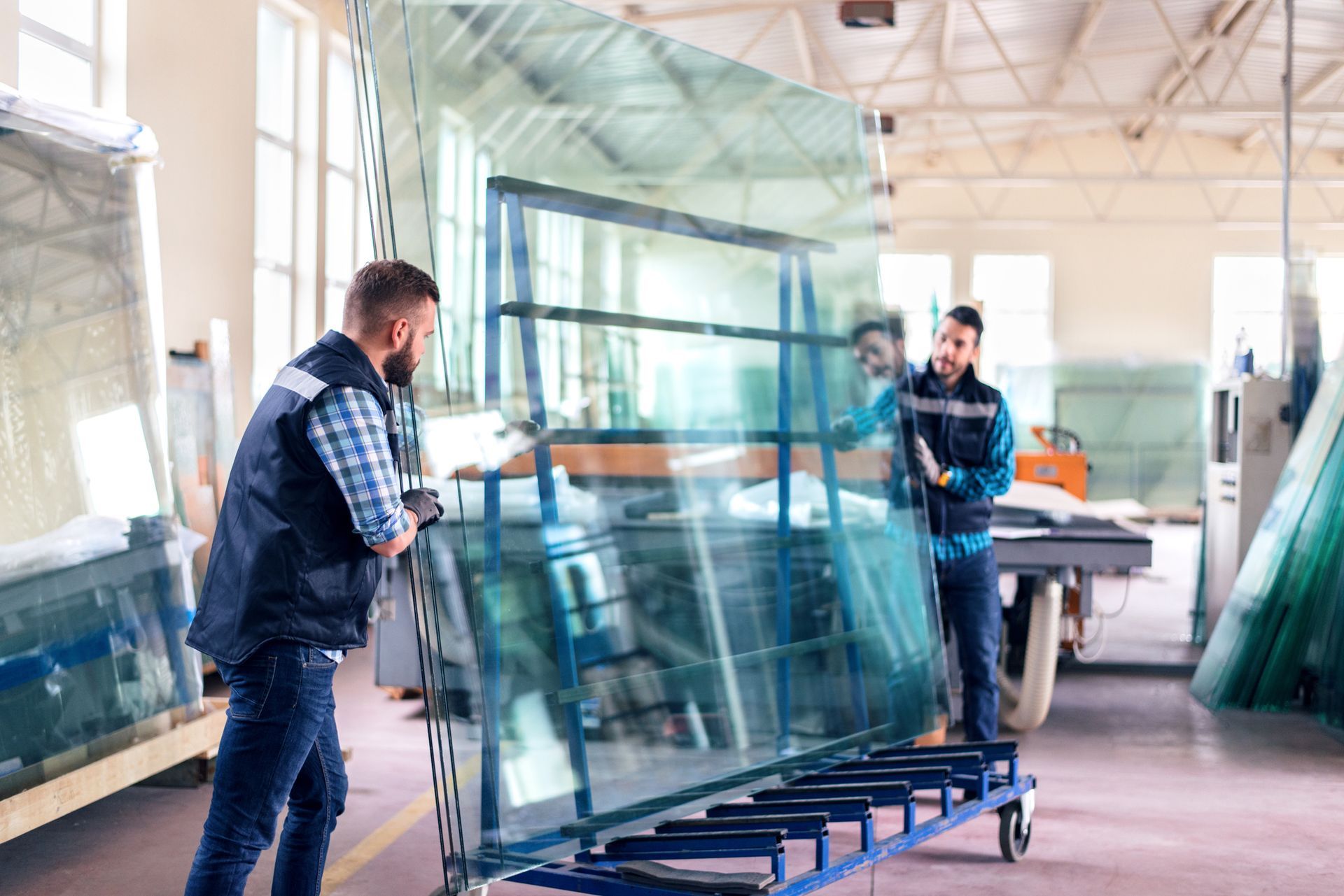 Workers Packaging Glass Sheets — Cape Coral, FL — Family Glass and Mirror Inc.