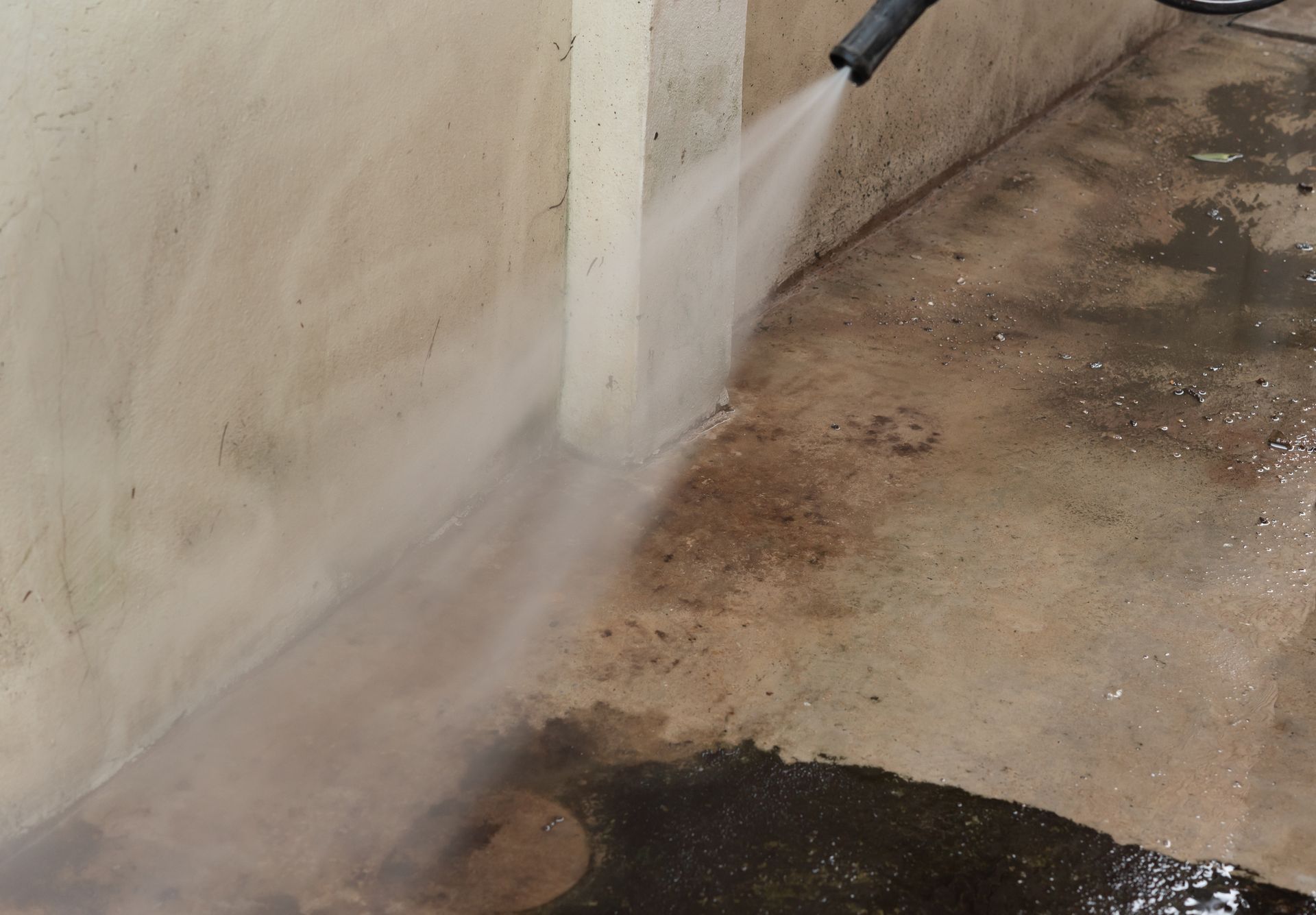 Close up Outdoor floor cleaning with high pressure water jet