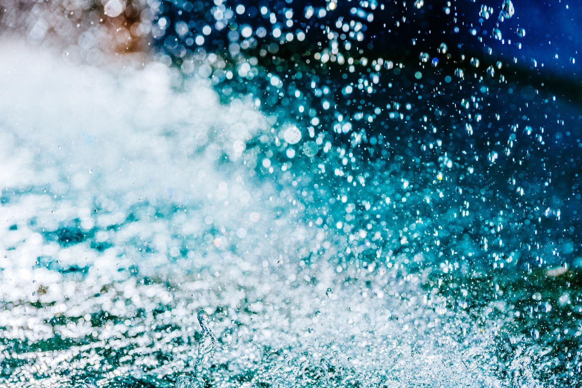 Vibrant blue water splash background illustrating professional drain cleaning with hydro jetting. Vibrant blue water splash background illustrating professional drain cleaning with hydro jetting.