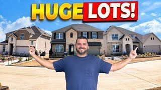 Man with arms outstretched in front of large houses, text reads