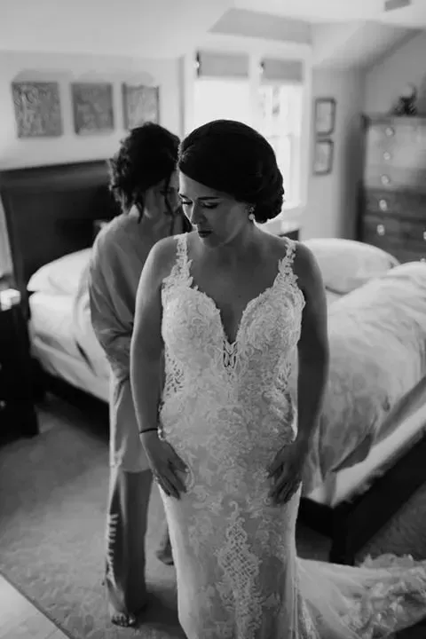 A black and white photo of a bride