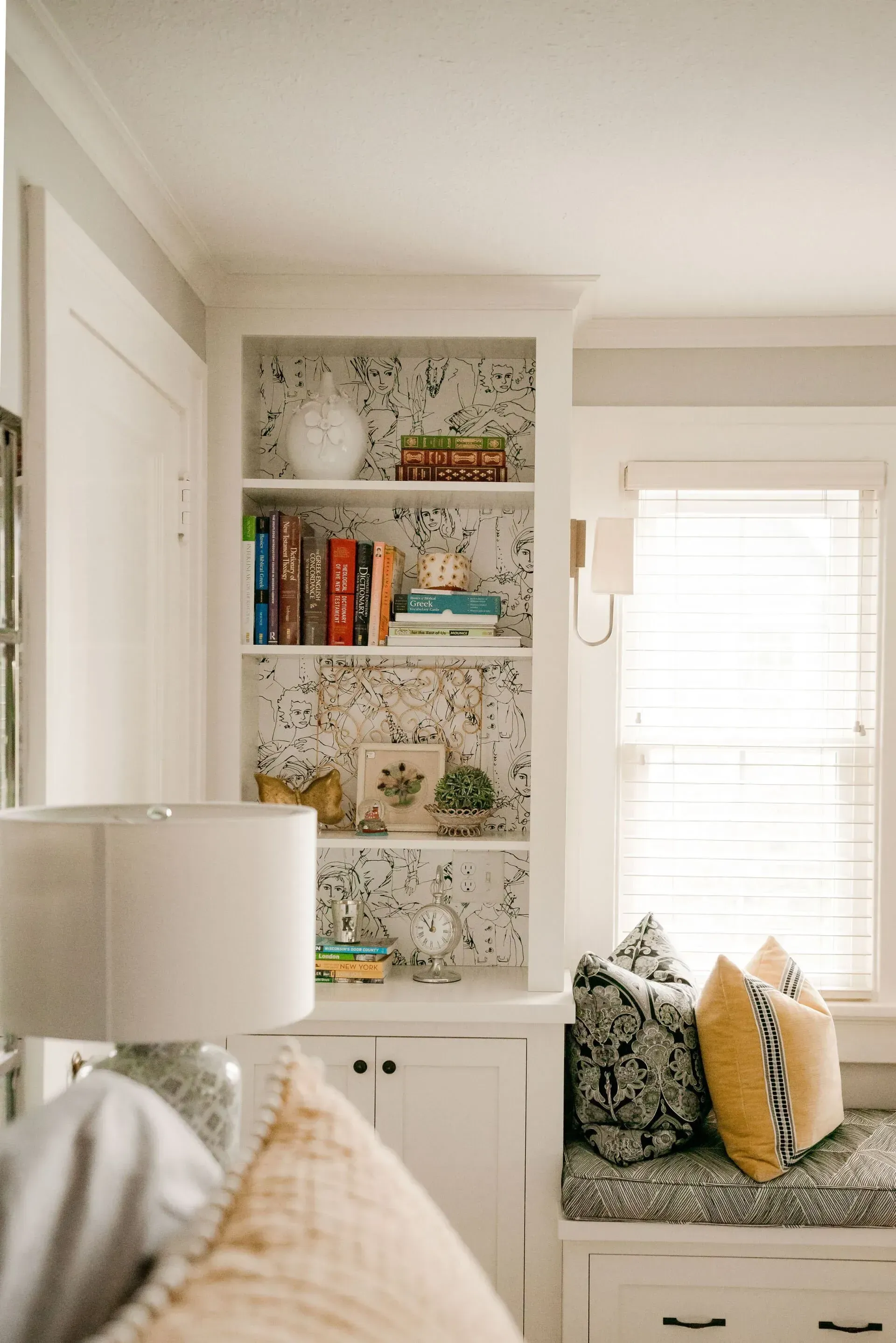 A living room with a bookshelf