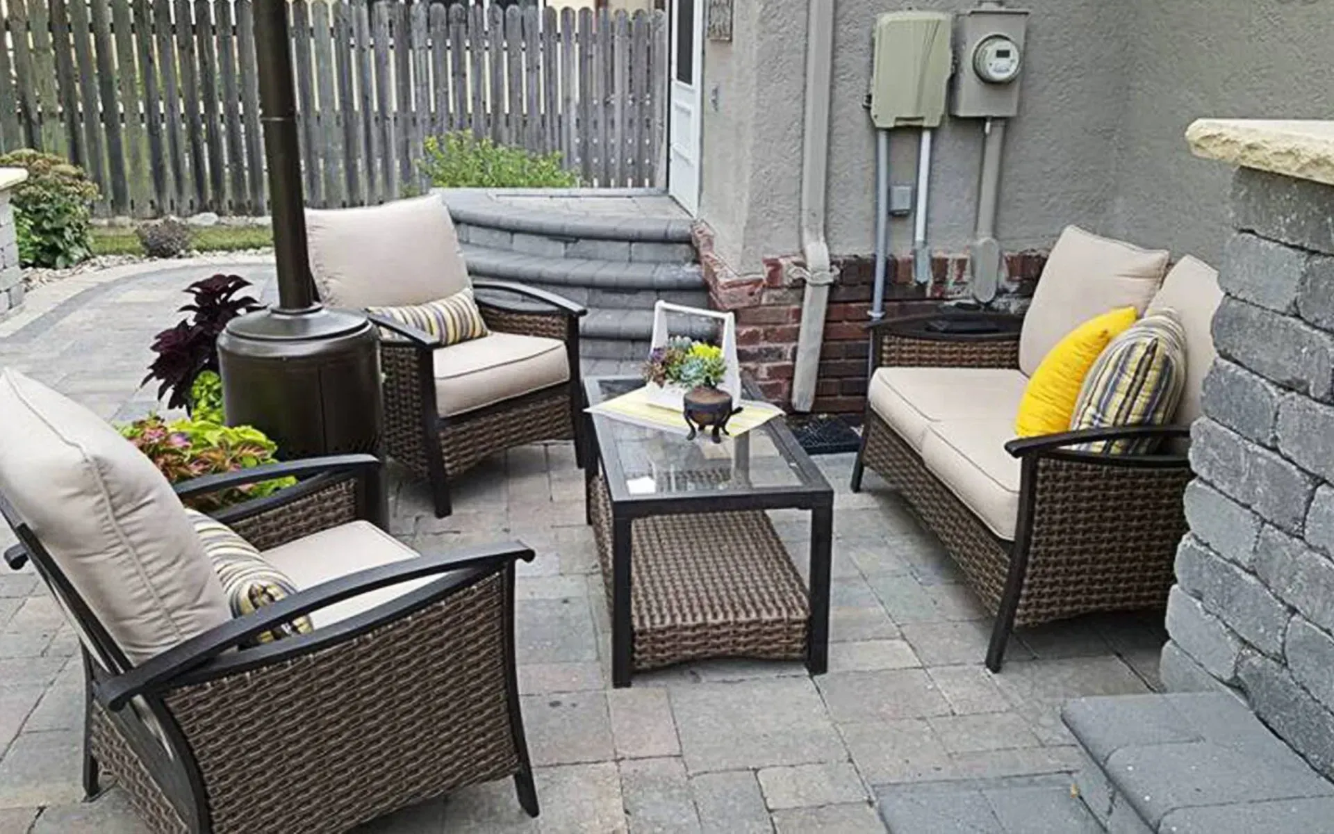 A patio with wicker furniture