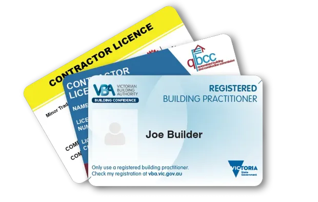 Stack of contractor license cards, including a blue registered building practitioner card on top.