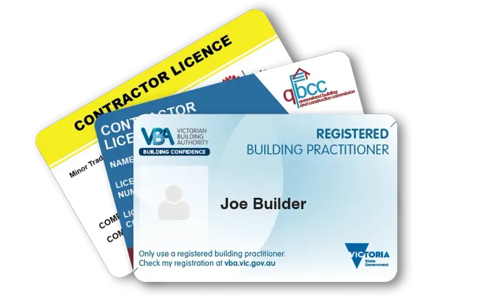 Stack of contractor license cards, including a blue registered building practitioner card on top.