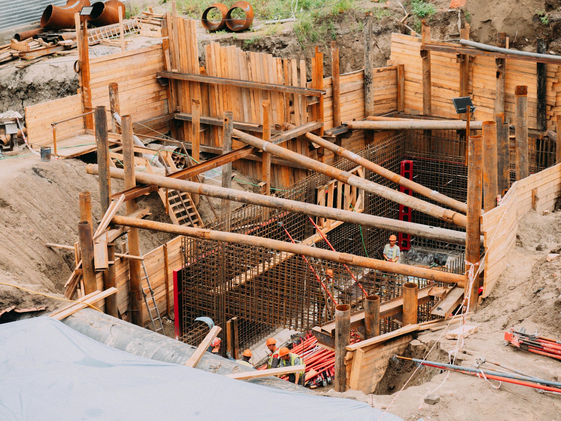 Construction site with wooden formwork and steel rebar for a concrete foundation