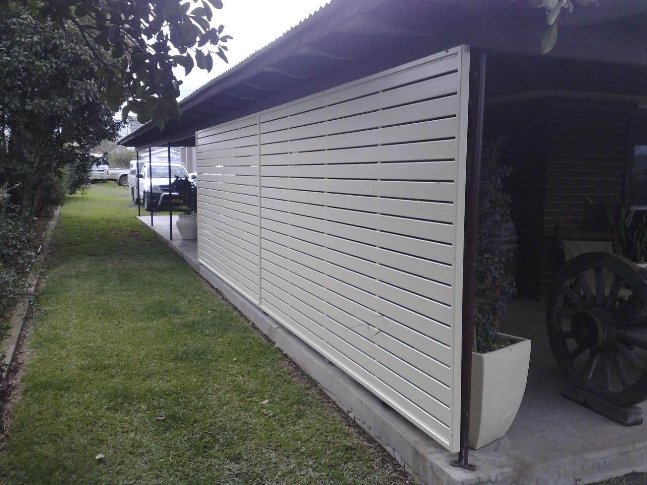 A White Fence Along the Side of a House — Hunter Valley Lattice in Kurri Kurri, NSW