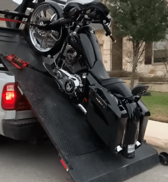 Motorcycle crashes and is in need of a tow truck in alhambra, CA