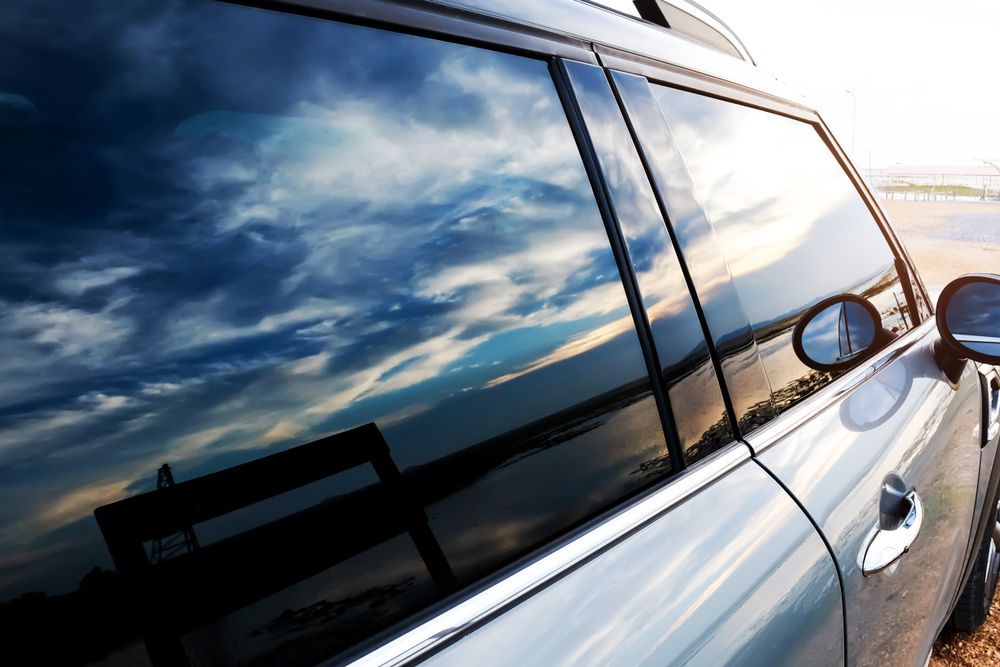 A Car Is Parked On The Beach — Raymond Terrace Windscreen Services In Maitland, NSW
