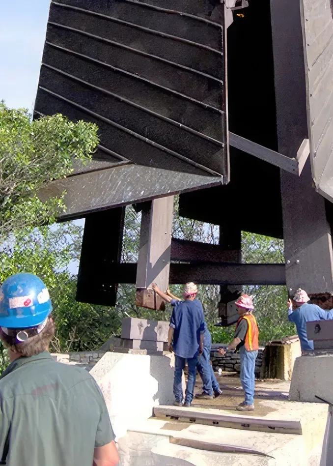 a crane with lifting a steel reinforced roof