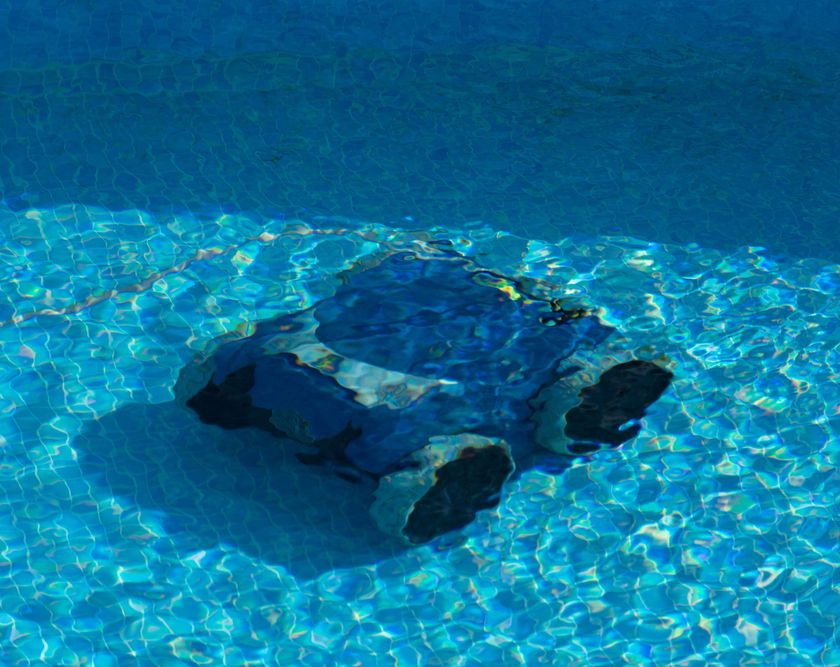 Man Repairing Pool Cleaner — NQ Pool Supplies in Smithfield, QLD