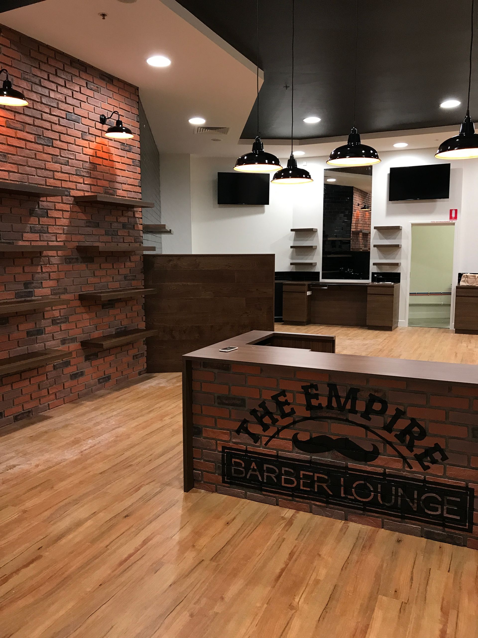 Interior of the Empire Barber Lounge With Brick Walls — Gray Projects in Woodford, QLD