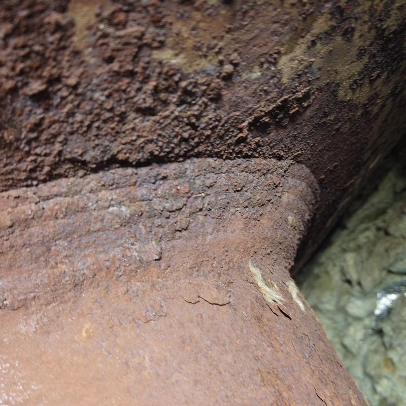 A close up of a rusty piece of metal