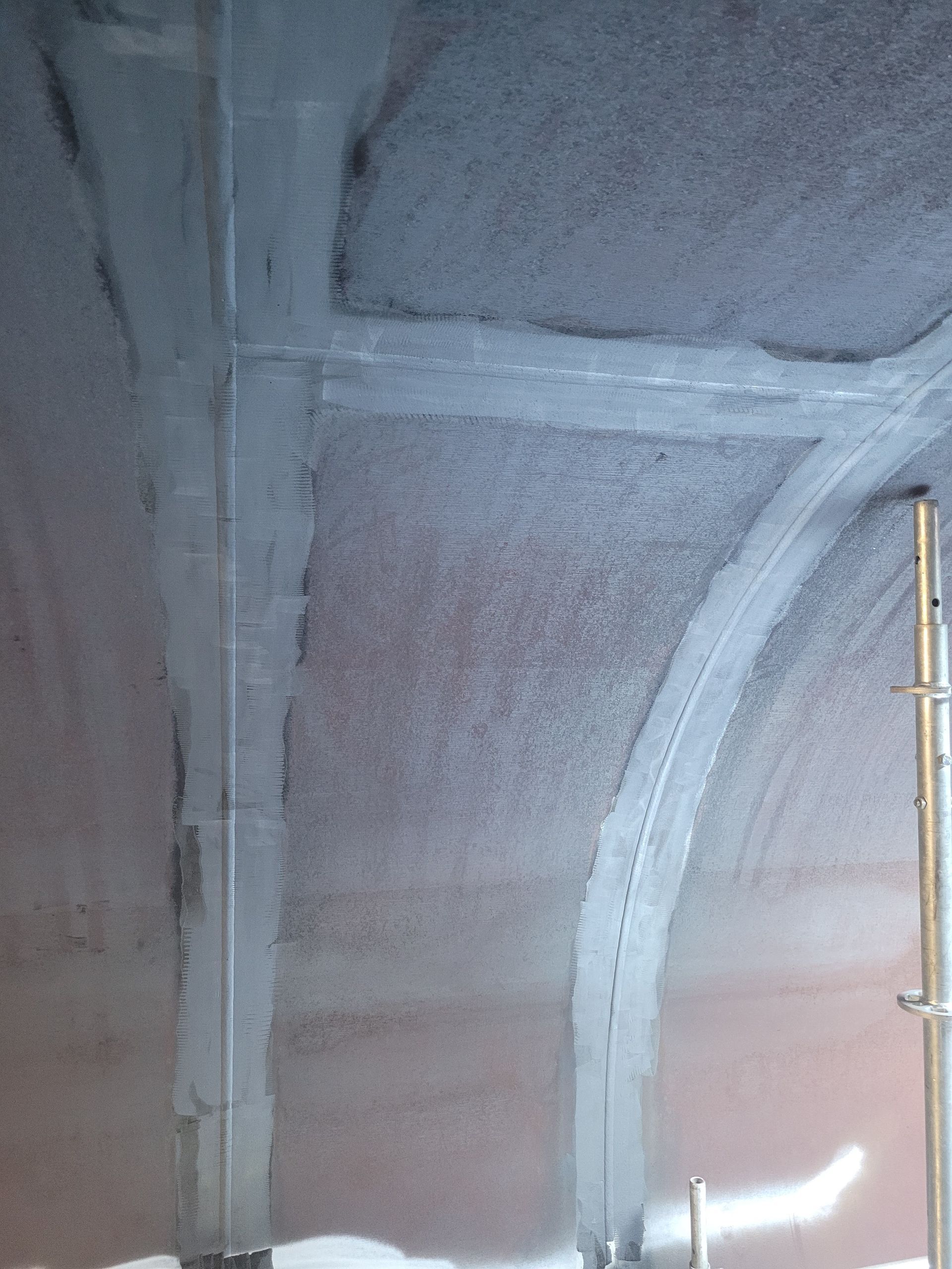 A close up of a ceiling with a few lines on it