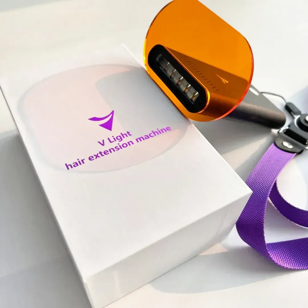 A v light hair extension machine with a purple strap