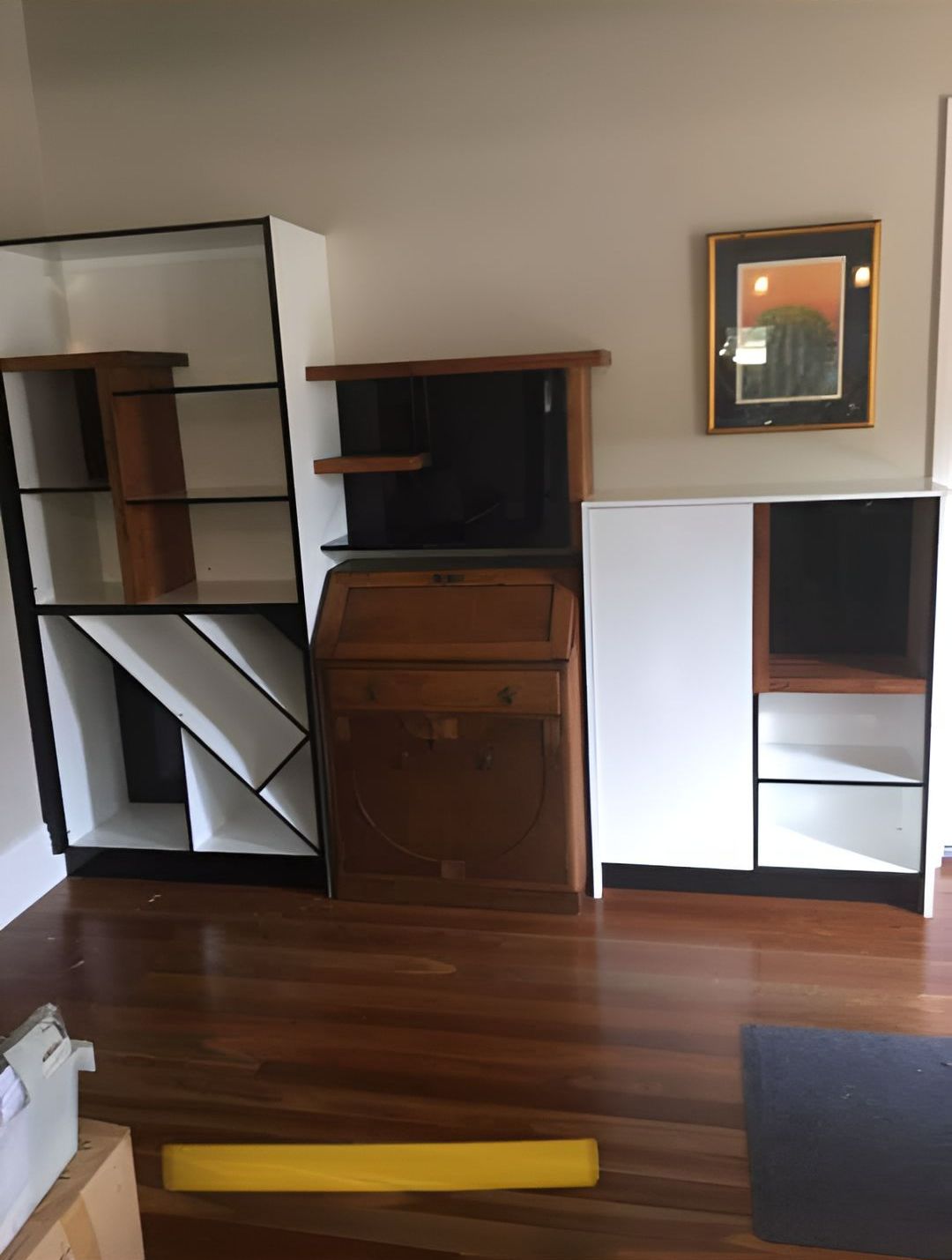A Corner of a Room With a Desk and Shelves — Tefa Kitchens & Joinery in Rutherford, NSW