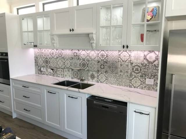 A Kitchen with LED lights and marble splash back — Tefa Kitchens & Joinery in Thornton, NSW