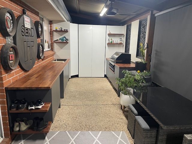 An Dark oak BBQ area of a house — Tefa Kitchens & Joinery in Thornton, NSW