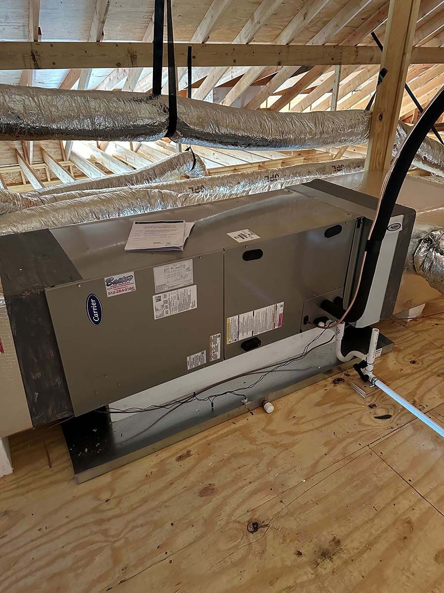 A large box is sitting on top of a wooden floor in a room.