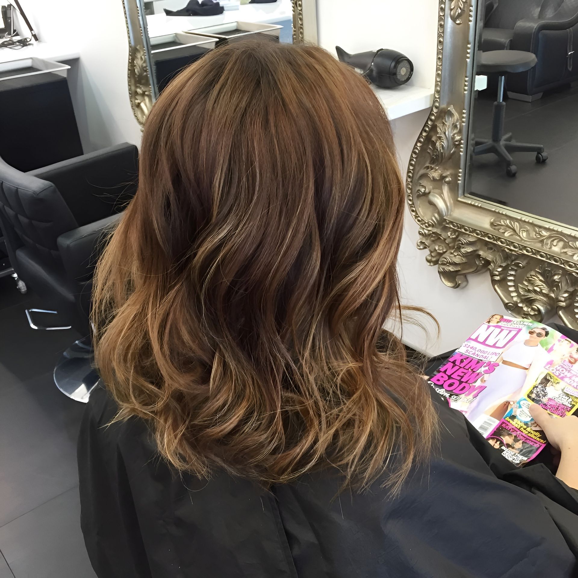 Woman With Wavy Brown Hair in a Salon — 5th Ave Hair Lounge in Caloundra, QLD